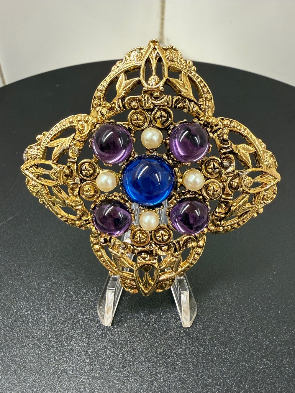 Ornate Gold-Tone Brooch with Blue, Purple, and Pearl Accents